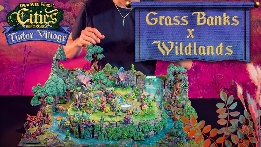 Nate demonstrating grass banks from the Tudor Village campaign with mountain, forest, and swamp terrain from wildlands