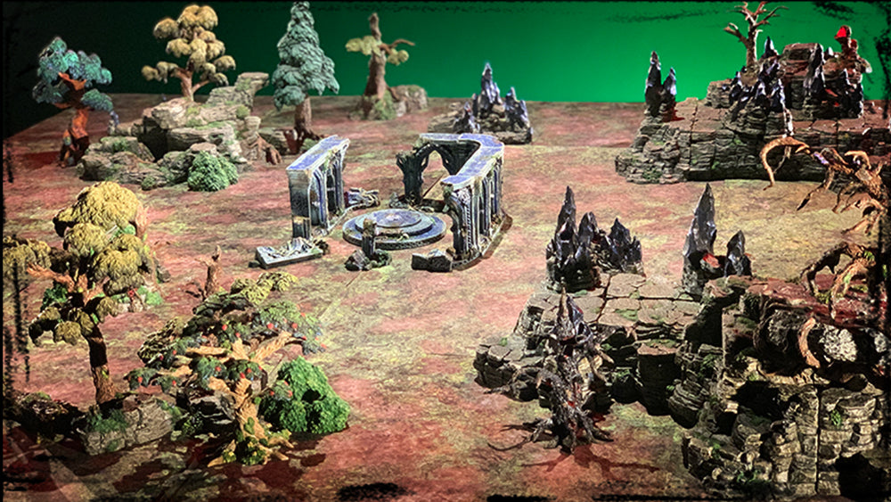 A grassy battlefield with mountain and Wyverstone scatter, stand-alone trees and the Elven ruins of Cailentyr