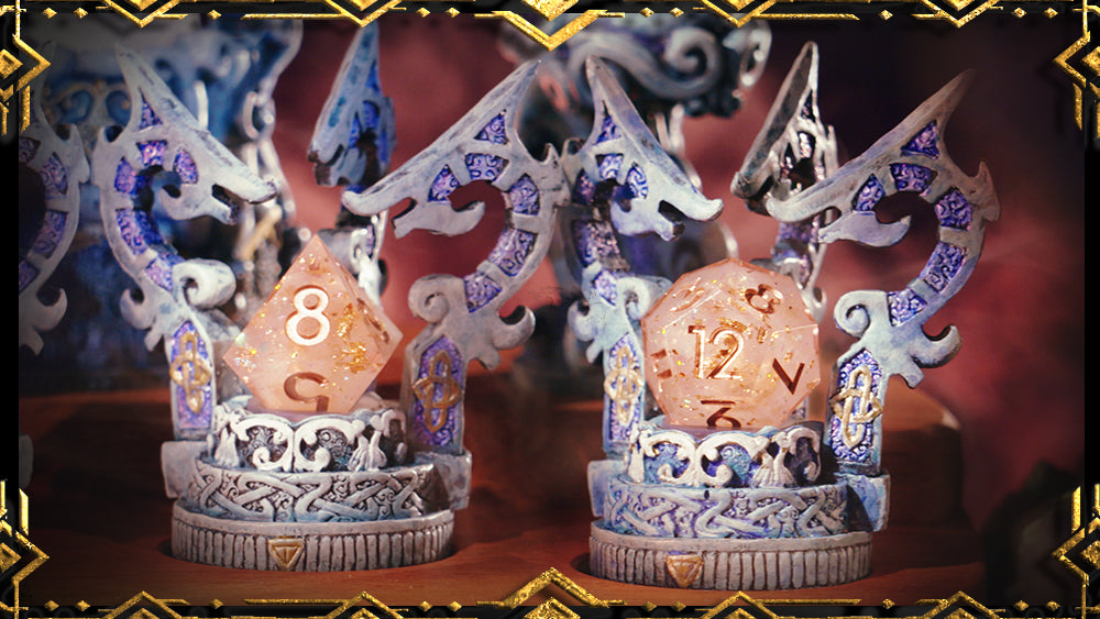 Detail of two elven thrones, pictured side-by-side, holding pink glitter dice.