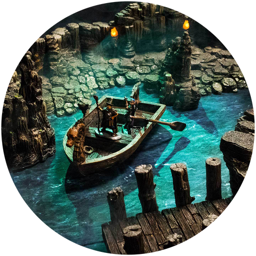 two miniatures navigate a barge through the murky waterways of Caverns Deep