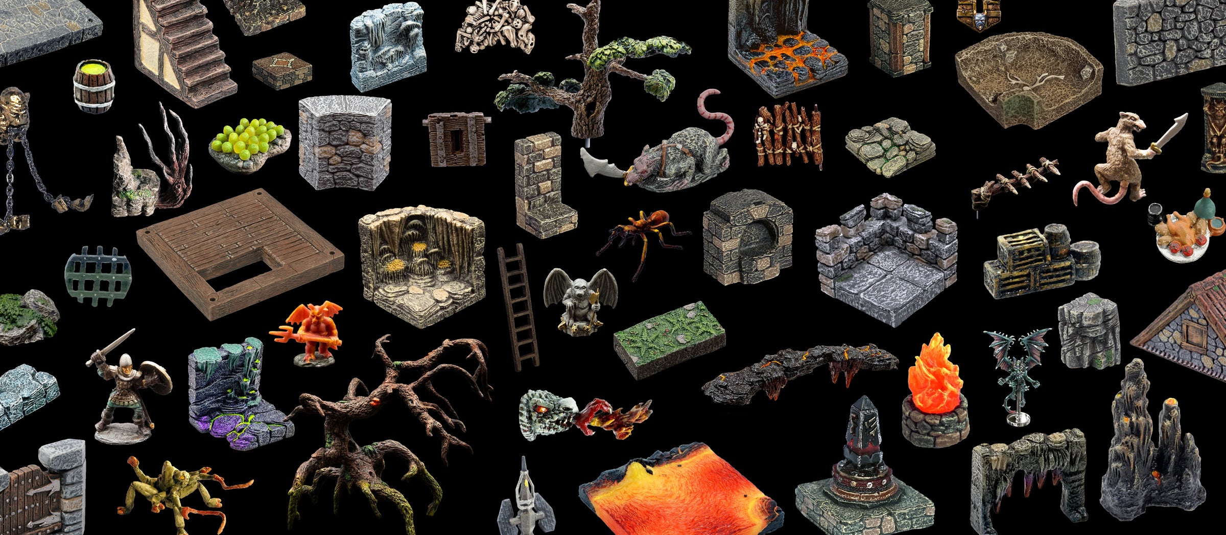 a variety of terrain pieces laid out over a black background
