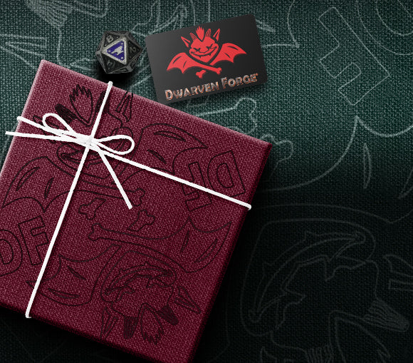 Dwarven Forge gift card, d20, and wrapped present