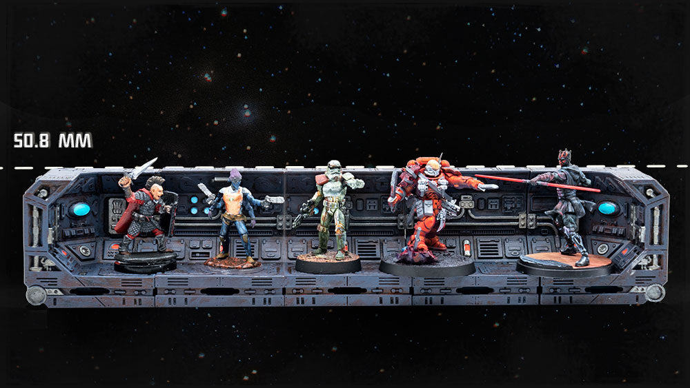 A variety of miniatures lined up along a row of alpha walls. A 50.8 millimeter marker line runs along the top of the walls, showing how alpha walls size up against miniatures from different gaming systems.